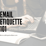 Someone typing an email on a laptop.