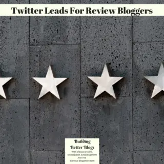 Four white stars on a grey wooden background.