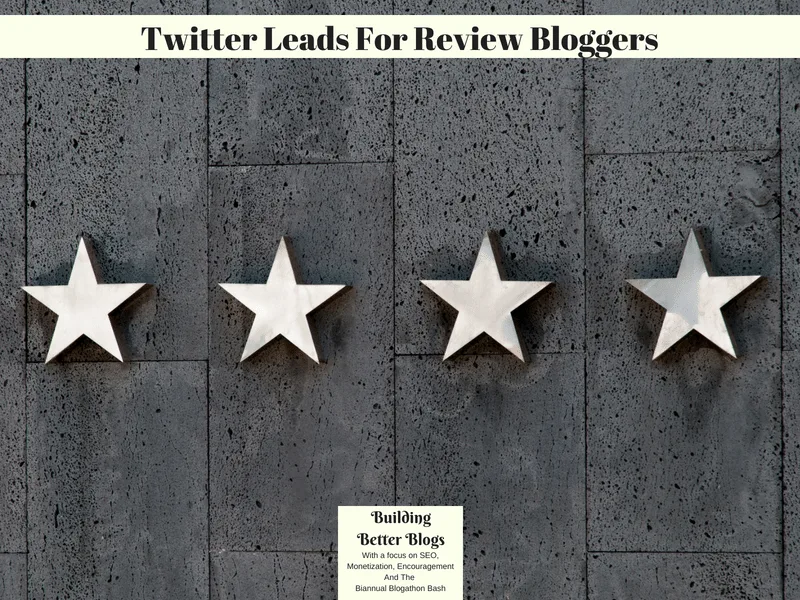 Four white stars on a grey wooden background.