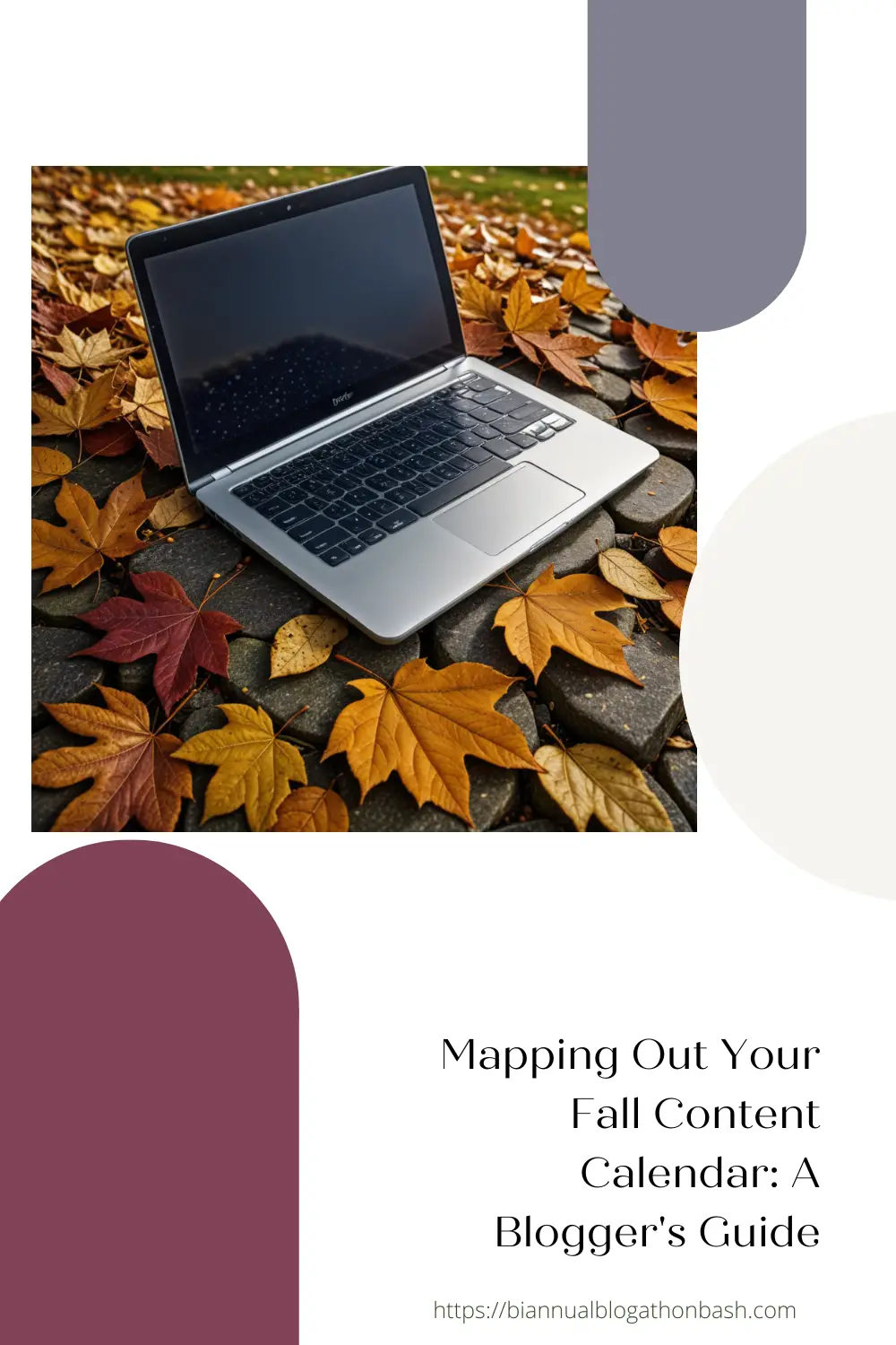 A laptop sitting on the ground surrounded by leaves.